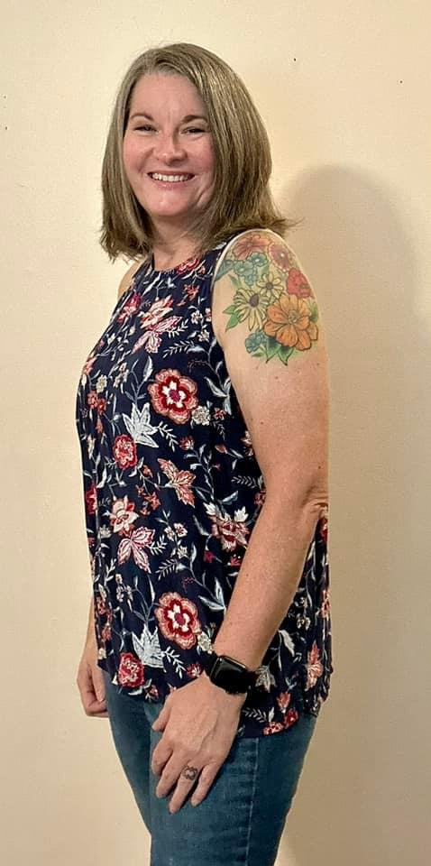 Tiffany from Illinois smiling after losing 25 pounds in menopause.